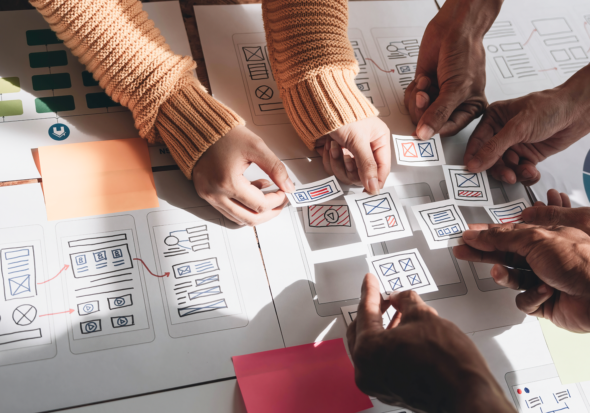 Designers working on wireframes.